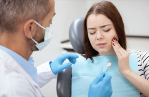 woman with tooth pain